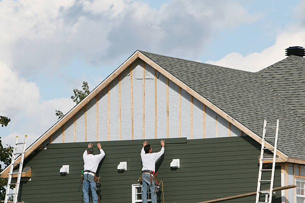 Professional Siding Repair technician working in Berryville, TX